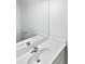 Bright bathroom featuring a sleek white sink, large mirror, and clean, modern design at 752 Raindrops Rd, Gastonia, NC 28054