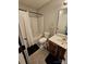 The full bathroom features a shower-tub combination with a single sink vanity and neutral paint at 7562 Petrea Ln, Charlotte, NC 28227