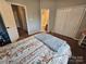 Comfortable main bedroom with en-suite bathroom entrance and double door closet for ample storage at 7562 Petrea Ln, Charlotte, NC 28227