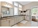 Spacious bathroom with granite counters, double sinks and natural lighting for a bright feel at 7913 Waverly Walk Ave, Charlotte, NC 28277