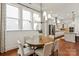 Open dining room with abundant natural light next to the kitchen at 7913 Waverly Walk Ave, Charlotte, NC 28277