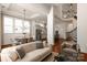 Bright living room with open floor plan next to the dining area and kitchen at 7913 Waverly Walk Ave, Charlotte, NC 28277