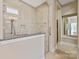 Luxurious walk-in shower with granite trim and tile surround offers a spa-like experience at 7913 Waverly Walk Ave, Charlotte, NC 28277