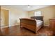 Bedroom featuring hardwood floors with classic furniture at 800 Old Little Rock Rd, Charlotte, NC 28214