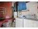 Laundry room with a desk, storage and washer/dryer at 800 Old Little Rock Rd, Charlotte, NC 28214