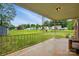 An exterior porch with a grassy yard and multiple homes in the background at 800 Old Little Rock Rd, Charlotte, NC 28214