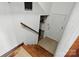 View of the stairwell leading to the home's basement with access to the backyard at 800 Old Little Rock Rd, Charlotte, NC 28214