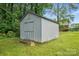 Close-up of the outdoor storage shed in the backyard, offering ample space for tools and equipment at 800 Old Little Rock Rd, Charlotte, NC 28214