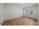Spacious and bright bedroom with two large windows allowing for plenty of natural light at 8215 Houser St, Cornelius, NC 28031
