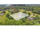 Lake Hickory home with a beautiful lot, surrounded by trees and a view of the lake at 827 River Hills Ct, Taylorsville, NC 28681
