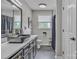 Modern bathroom with a stylish vanity, vessel sink, and elegant black and white decor at 827 River Hills Ct, Taylorsville, NC 28681