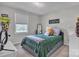This cozy bedroom has a window and carpeted floors, ideal for a peaceful and relaxing space at 827 River Hills Ct, Taylorsville, NC 28681