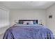 Bright bedroom offering a comfortable bed, soft carpet, and ample natural light at 827 River Hills Ct, Taylorsville, NC 28681