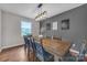 Cozy dining room with a wood table, chair seating, and a decorative pendant light at 827 River Hills Ct, Taylorsville, NC 28681