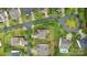 Aerial view of the property showcasing the landscaped yard, patio, and surrounding neighborhood at 9530 Hightower Oak St, Huntersville, NC 28078