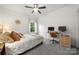 Bedroom featuring a bed, desk, and a large window at 9530 Hightower Oak St, Huntersville, NC 28078