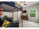Bedroom with carpet floors, a ceiling fan and black metal bunk beds at 9530 Hightower Oak St, Huntersville, NC 28078