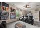 Home theatre or game room featuring a television and several leather recliners at 9530 Hightower Oak St, Huntersville, NC 28078