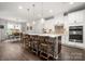 Bright, modern kitchen with stainless steel appliances, large island, and pendant lighting at 9530 Hightower Oak St, Huntersville, NC 28078
