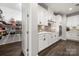 Well-lit kitchen featuring stainless steel appliances and a walk-in pantry at 9530 Hightower Oak St, Huntersville, NC 28078