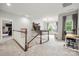 Loft featuring a desk, treadmill, and a view to the outside at 9530 Hightower Oak St, Huntersville, NC 28078