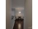 Cozy dining area with hardwood floors, elegant lighting, and seating for two at 1000 E Woodlawn Rd # 107, Charlotte, NC 28209