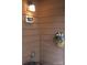 Close-up of unit 107 with a decorative floral hanging basket at 1000 E Woodlawn Rd # 107, Charlotte, NC 28209