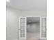 Open view of a basement with double doors leading to another section at 1030 Pinehurst Ln, Fort Mill, SC 29707