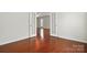 French doors open to living area, highlighting the wood floors at 1030 Pinehurst Ln, Fort Mill, SC 29707
