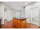 Kitchen island offers extra storage, prep space, and countertop seating in this eat in kitchen at 1030 Pinehurst Ln, Fort Mill, SC 29707