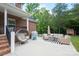 Home's backyard patio includes seating and a grill at 106 Hannaford Pl # 15, Gastonia, NC 28052