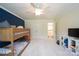 Bedroom features large window, ceiling fan, bunk bed, and a television at 106 Hannaford Pl # 15, Gastonia, NC 28052