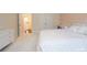 Bedroom featuring a white patterned bed, closet, and dresser at 106 Hannaford Pl # 15, Gastonia, NC 28052
