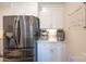 Bright kitchen features stainless steel appliances, white cabinets, and modern coffee station at 106 Hannaford Pl # 15, Gastonia, NC 28052
