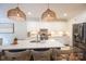 Modern kitchen with white cabinets, stainless steel appliances, and a spacious island at 106 Hannaford Pl # 15, Gastonia, NC 28052