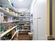 Organized pantry features ample shelving for food storage and small appliances at 106 Hannaford Pl # 15, Gastonia, NC 28052
