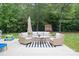 Outdoor patio set with comfortable seating, perfect for relaxing and entertaining outdoors at 106 Hannaford Pl # 15, Gastonia, NC 28052