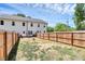 Backyard view with a full wooden fence and partial lawn area at 1066 Mclain Rd # 14, Kannapolis, NC 28083