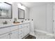 Bright bathroom featuring a double vanity with white cabinets and marble floors at 1066 Mclain Rd # 14, Kannapolis, NC 28083