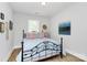 Cozy bedroom with a bed, side tables, and a window offering natural light at 1066 Mclain Rd # 14, Kannapolis, NC 28083