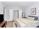 Comfortable bedroom with ensuite bathroom access, vaulted ceilings, and natural lighting at 1066 Mclain Rd # 14, Kannapolis, NC 28083