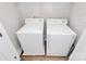 Convenient laundry area with a white washer and dryer at 1066 Mclain Rd # 14, Kannapolis, NC 28083