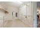Spacious walk-in closet featuring adjustable shelving and ample storage options at 1120 N College St, Mount Pleasant, NC 28124