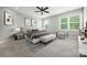 Comfortable bedroom with a large bed, stylish decor, and lots of natural light from the windows at 1162 E 36Th St, Charlotte, NC 28205