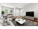 Bright living room with modern furnishings and a large window at 1162 E 36Th St, Charlotte, NC 28205