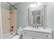 Updated bathroom features a shower-tub combination with a modern sink and toilet at 129 Alder Springs Ln, Mooresville, NC 28117