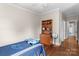 Bedroom features hardwood floors and a closet with plenty of storage space at 129 Alder Springs Ln, Mooresville, NC 28117