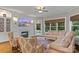Comfortable living room with a fireplace, built-in shelves, and plush seating at 129 Alder Springs Ln, Mooresville, NC 28117