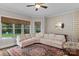 Cozy living room with large windows, comfortable seating, and stylish decor at 129 Alder Springs Ln, Mooresville, NC 28117