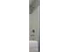 Standard shower and bath fixtures provide a basic bathing option at 13913 Pinyon Pine Ln, Charlotte, NC 28215